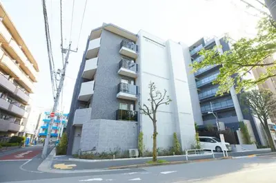 a tall building with a white truck parked in front of it at SG Premium KASAI - Vacation STAY 44284v in Tokyo