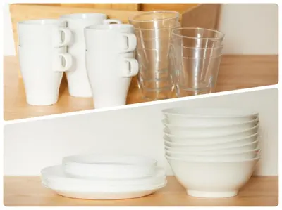 a shelf filled with white dishes and glasses at SG Premium KASAI - Vacation STAY 44284v in Tokyo