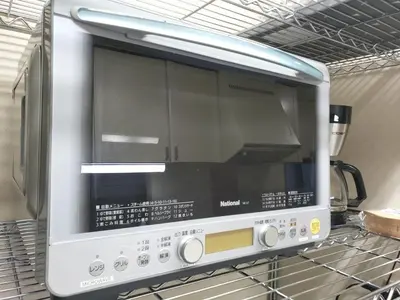 a microwave oven sitting on top of a kitchen counter at Within walking distance of Disneyland! - Vacation STAY 11473 in Urayasu