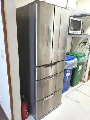 a stainless steel refrigerator in a kitchen at Within walking distance of Disneyland! - Vacation STAY 11473 in Urayasu