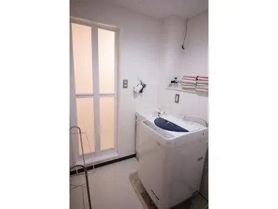 a white bathroom with a sink and a window at Central Field - Vacation STAY 29651v in Tokyo