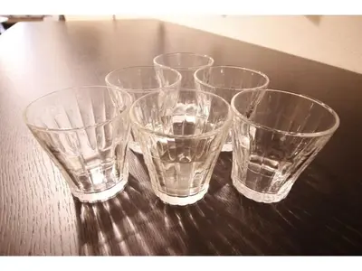 four empty glasses sitting on top of a table at Central Field - Vacation STAY 29651v in Tokyo