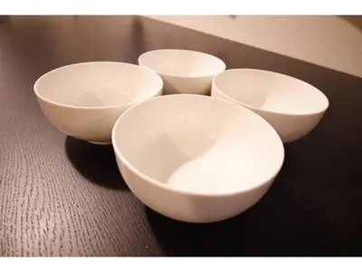 four white bowls are sitting on a table at Central Field - Vacation STAY 29651v in Tokyo
