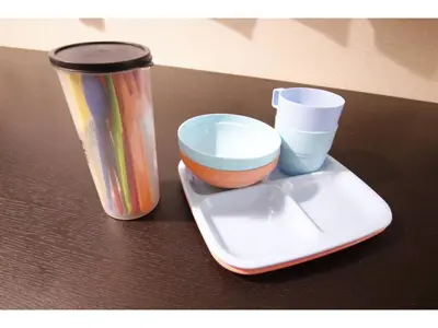 a table with a container and a cup on a tray at Central Field - Vacation STAY 29651v in Tokyo