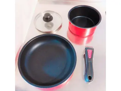 a black plate sitting next to a measuring cup and a utensil at Central Field - Vacation STAY 29627v in Tokyo