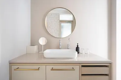 a bathroom with a white sink and a mirror at hotel hisoca ikebukuro in Tokyo