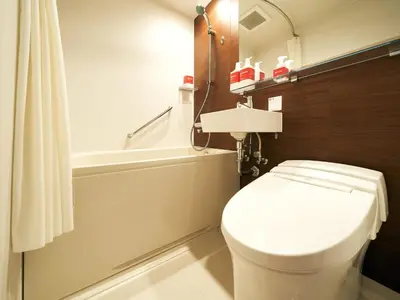a bathroom with a white toilet and a bath tub at Rakuten STAY Tokyo Asakusa Single Room in Tokyo
