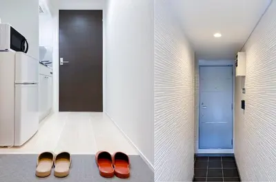 a pair of shoes sitting on the floor in a hallway at japan house shinkoiwa in Tokyo