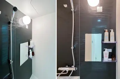 a bathroom with a shower with a glass shower stall at japan house shinkoiwa in Tokyo