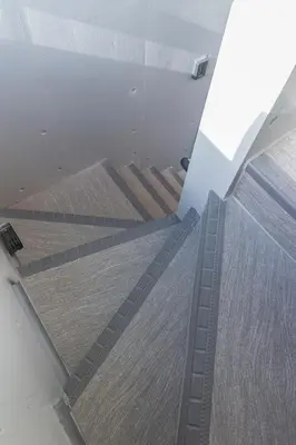 an overhead view of stairs in a building at japan house edogawabashi in Tokyo
