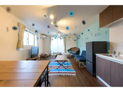 a room with a kitchen and a living room at rakuna Inn Dou-sasazuka - Vacation STAY 47231v in Tokyo