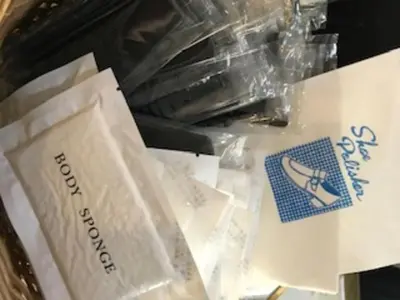 a box with a bottle of wine and a sticker on it at Sky Heart Hotel Koiwa - Vacation STAY 49085v in Tokyo