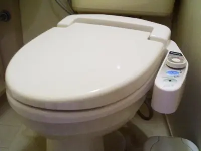 a bathroom with a white toilet in a bathroom at Sky Heart Hotel Koiwa - Vacation STAY 49100v in Tokyo