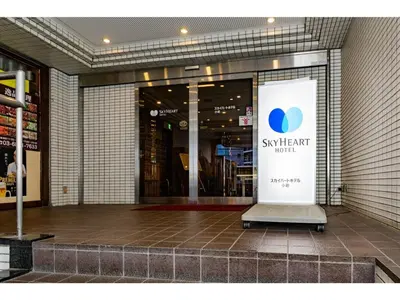 a store front of a store with a sign in the window at Sky Heart Hotel Koiwa - Vacation STAY 49104v in Tokyo