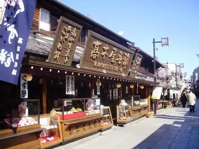 a store with signs on the side of a street at Sky Heart Hotel Koiwa - Vacation STAY 49104v in Tokyo