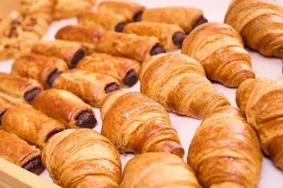 a bunch of pastries sitting on top of a table at Keisei Richmond Hotel Tokyo Kinshicho in Tokyo