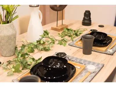 a wooden table with two plates and cups on it at Tora Hotel Skytree - Vacation STAY 51807v in Tokyo