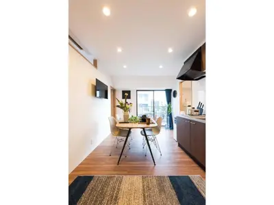 a kitchen and dining room with a table and chairs at Tora Hotel Skytree - Vacation STAY 51807v in Tokyo