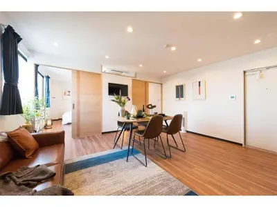a living room with a couch and a table at Tora Hotel Skytree - Vacation STAY 51816v in Tokyo