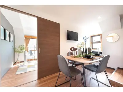 a dining room with a table and chairs at Tora Hotel Rikugien - Vacation STAY 52744v in Tokyo