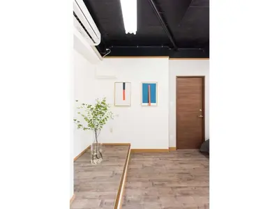 a hallway with a glass table and a door at Tora Hotel Rikugien - Vacation STAY 52726v in Tokyo