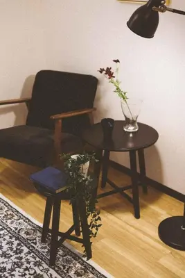 a living room with two tables and a couch at Tora Hotel Ueno - Vacation STAY 52809v in Tokyo