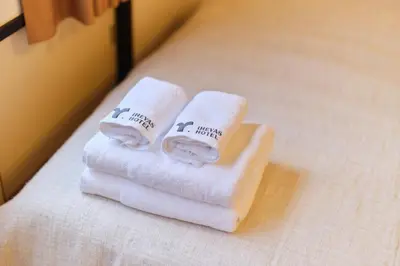 two towels sitting on top of a bed at Tora Hotel Ueno - Vacation STAY 52809v in Tokyo