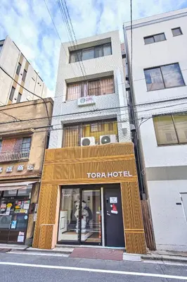 a store front of a hotel on a city street at Tora Hotel Ueno - Vacation STAY 52806v in Tokyo
