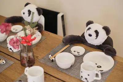 two stuffed panda bears sitting on a table at Tora Hotel Ueno - Vacation STAY 52806v in Tokyo