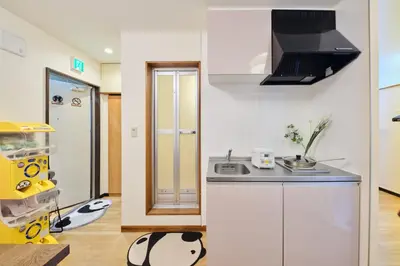 a kitchen with a sink and a counter top at Tora Hotel Ueno - Vacation STAY 52811v in Tokyo