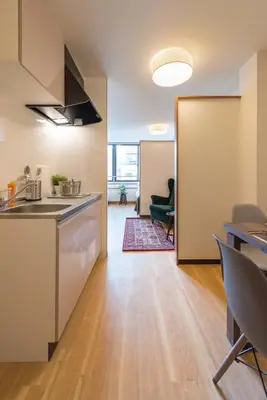 an open kitchen and living room in an apartment at Tora Hotel Ueno - Vacation STAY 52811v in Tokyo