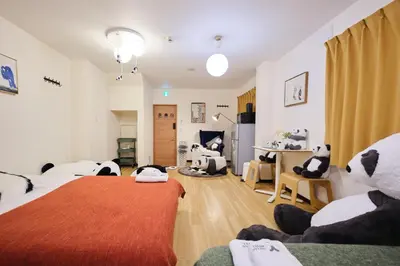 a room with a bed with stuffed animals on it at Tora Hotel Ueno - Vacation STAY 52751v in Tokyo