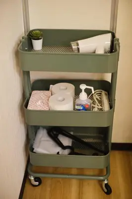 a green shelf with items on it in a room at Tora Hotel Ueno - Vacation STAY 52751v in Tokyo