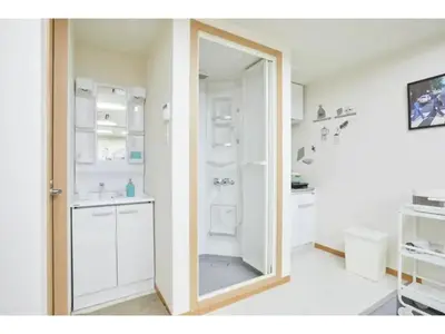 a mirror in a bathroom with a sink and a shower at Tora Hotel Taito - Vacation STAY 53048v in Tokyo