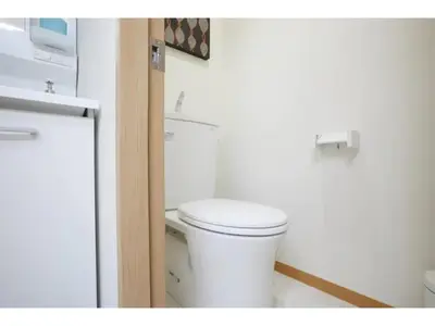 a bathroom with a white toilet in a room at Tora Hotel Taito - Vacation STAY 53053v in Tokyo