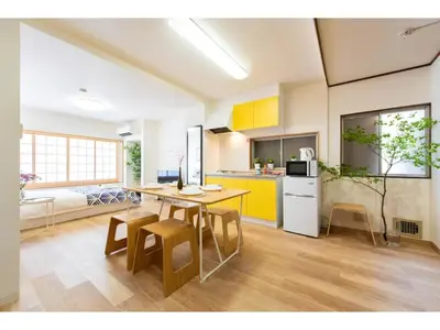 a kitchen and dining room with a table and chairs at Tora Hotel Taito - Vacation STAY 53094v in Tokyo
