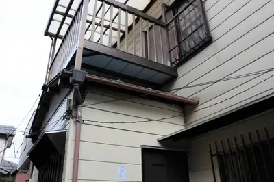 a balcony on the side of a house at \u30ea\u30c6\u30c3\u30af\u30b9\u6d66\u5b89 in Tokyo