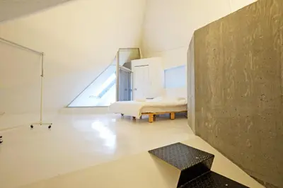 a bedroom with a bed and a large window at MONO - Vacation STAY 54271v in Tokyo