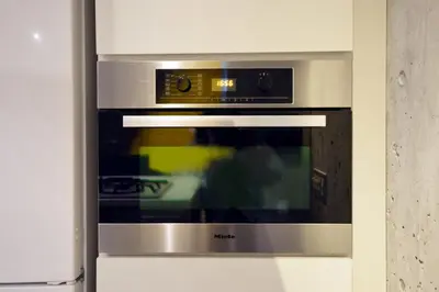 a stainless steel microwave oven in a kitchen at MONO - Vacation STAY 54271v in Tokyo