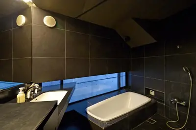 a bathroom with a sink and a bath tub at MONO - Vacation STAY 54271v in Tokyo
