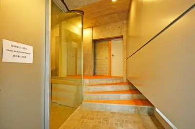 a staircase in a building with a sign on the wall at MONO - Vacation STAY 54271v in Tokyo