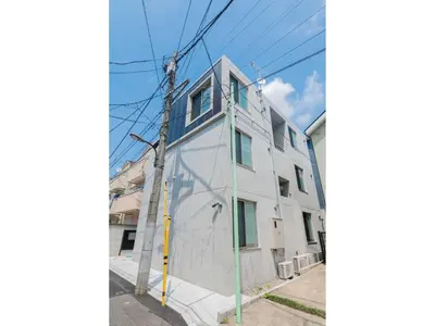 an apartment building with a mural on the side of it at bmj Hyakunincho - Vacation STAY 68273v in Tokyo
