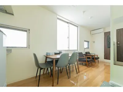 a dining room with a table and chairs at bmj Hyakunincho - Vacation STAY 68270v in Tokyo