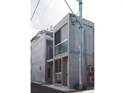 a building on a street next to a pole at bmj Shinjuku Okubo - Vacation STAY 68282v in Tokyo