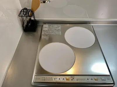 a toilet seat with two white circles on it at \u30ef\u30f3\u30cf\u30a6\u30b9\u65b0\u5c0f\u5ca9 in Tokyo