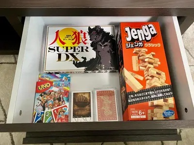 a box of games on a shelf at \u30ef\u30f3\u30cf\u30a6\u30b9\u65b0\u5c0f\u5ca9 in Tokyo
