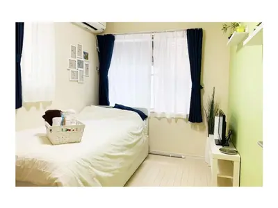 a bedroom with a white bed and a window at OHANA TOKYO HOUSE - Vacation STAY 71658v in Tokyo
