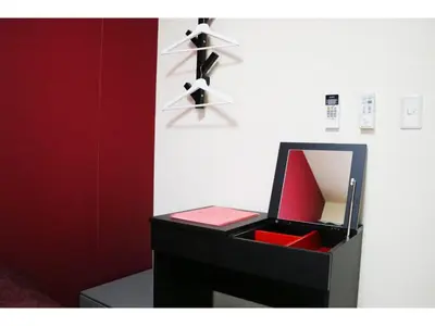 a black box with a mirror on a wall at OHANA TOKYO HOUSE - Vacation STAY 73208v in Tokyo