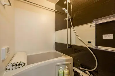 a bathroom with a bath tub and a shower at Marvelous Ryogoku - Vacation STAY 73442v in Tokyo