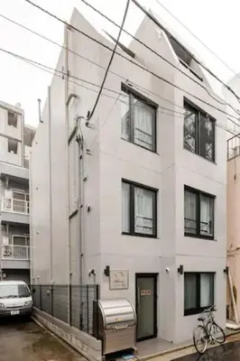 a white building with a bike parked in front of it at Marvelous Ryogoku - Vacation STAY 74211v in Tokyo